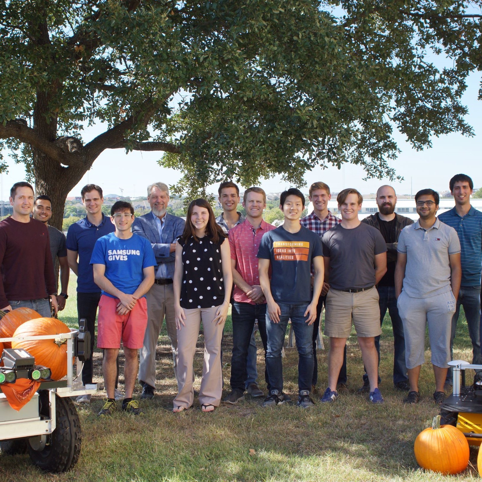 photo of the robotics group standing outside